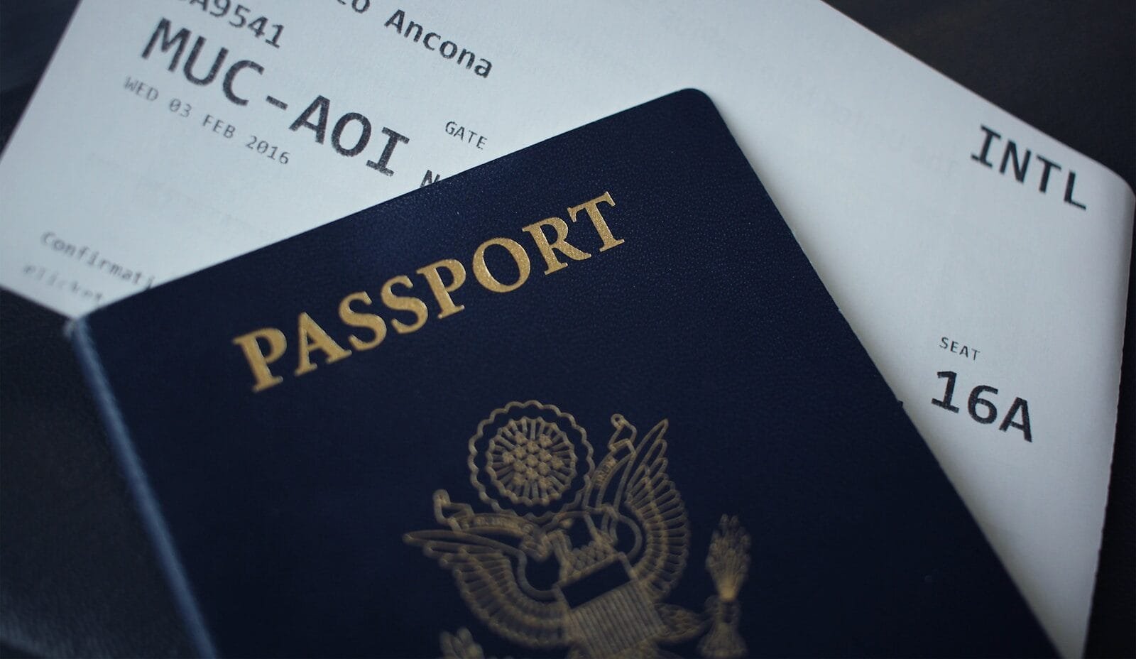 US passport book and Lufthansa boarding pass for REAL ID compliant travel